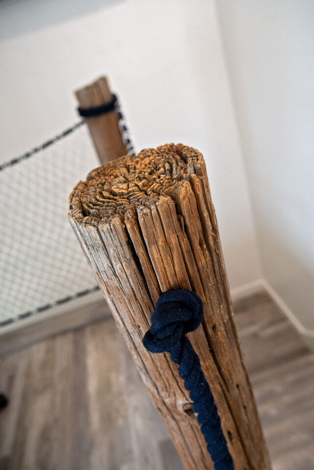 rustic post in a nautical new construction project