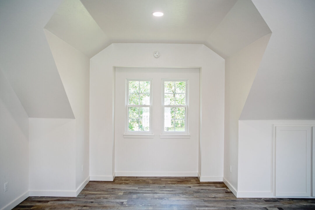 layered ceilings and paned windows in a new construction