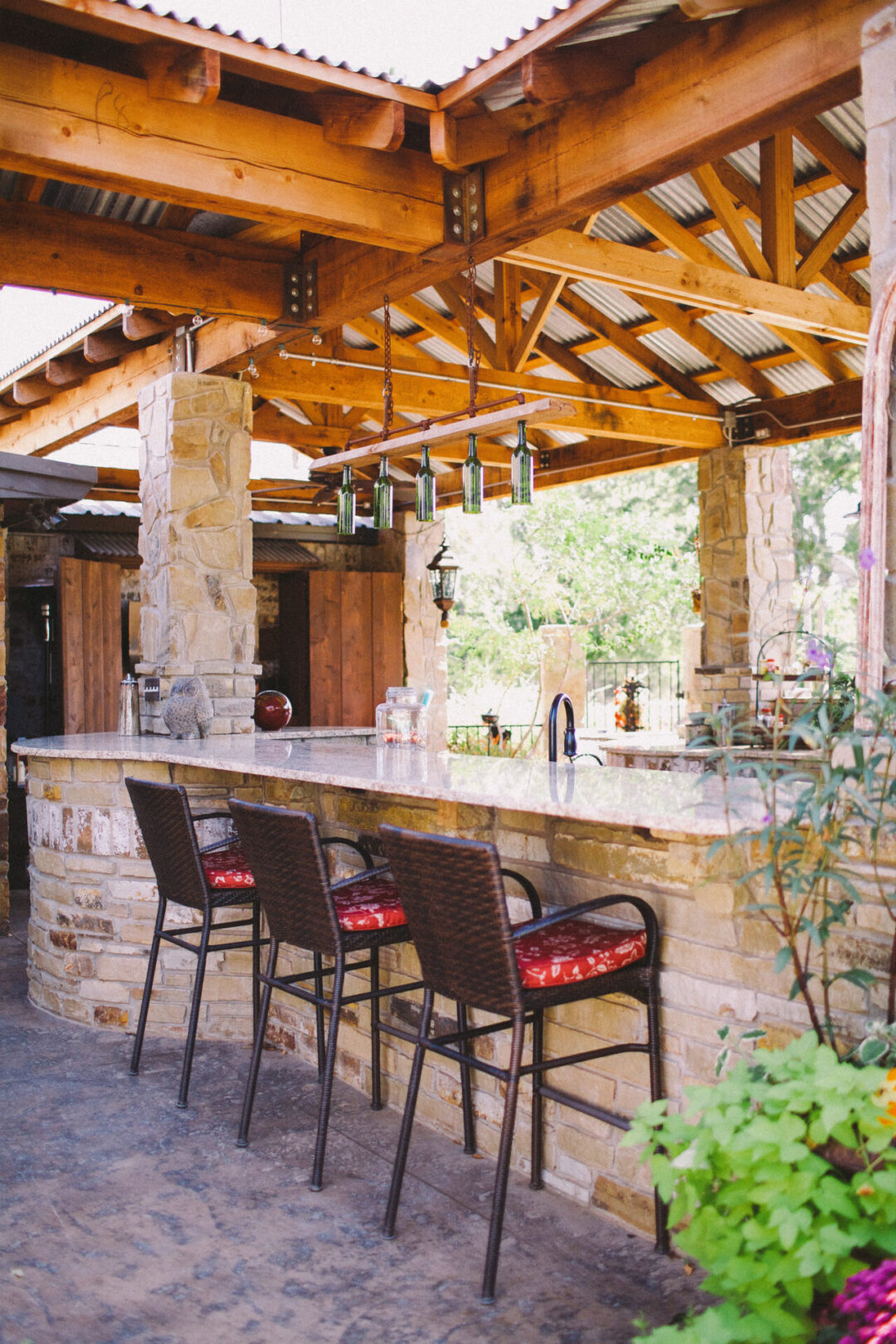 covered patio and outdoor kitchen and bar constructed by Boyer and Sons